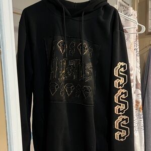 Black Graphic Hoodie with Gold Accents